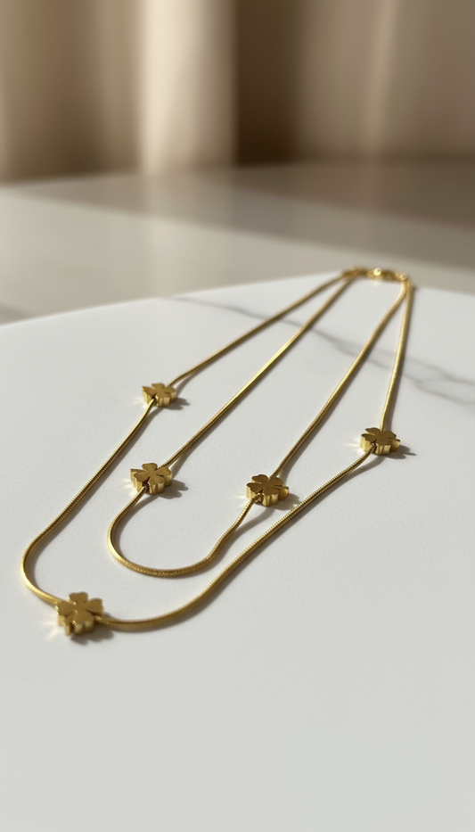 Elegant gold double-layer necklace with clover leaf pendants for women