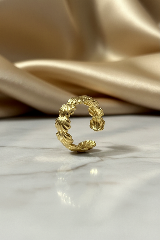 Elegant gold pearl shell design adjustable cuff ring with matte finish.